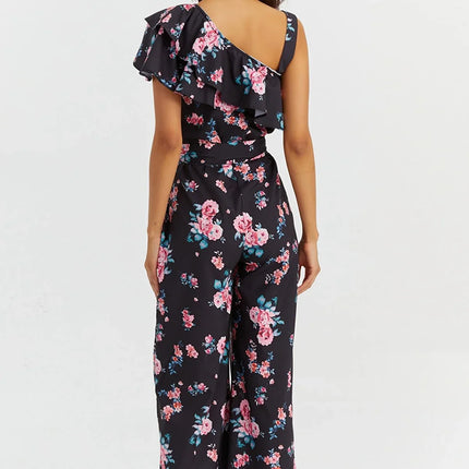 UNICORN Women's jumpsuit flowers black s m l