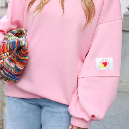 Oversized sweater good vibes roze