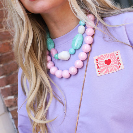 Soleil patch sweater lila