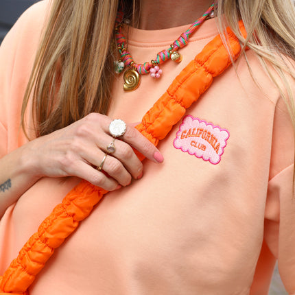 California sweater oranje