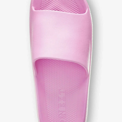 UNICORN Slippers with a wide strap over the foot and a sole with a pre-formed footbed and a ribbed profile on the bottom.