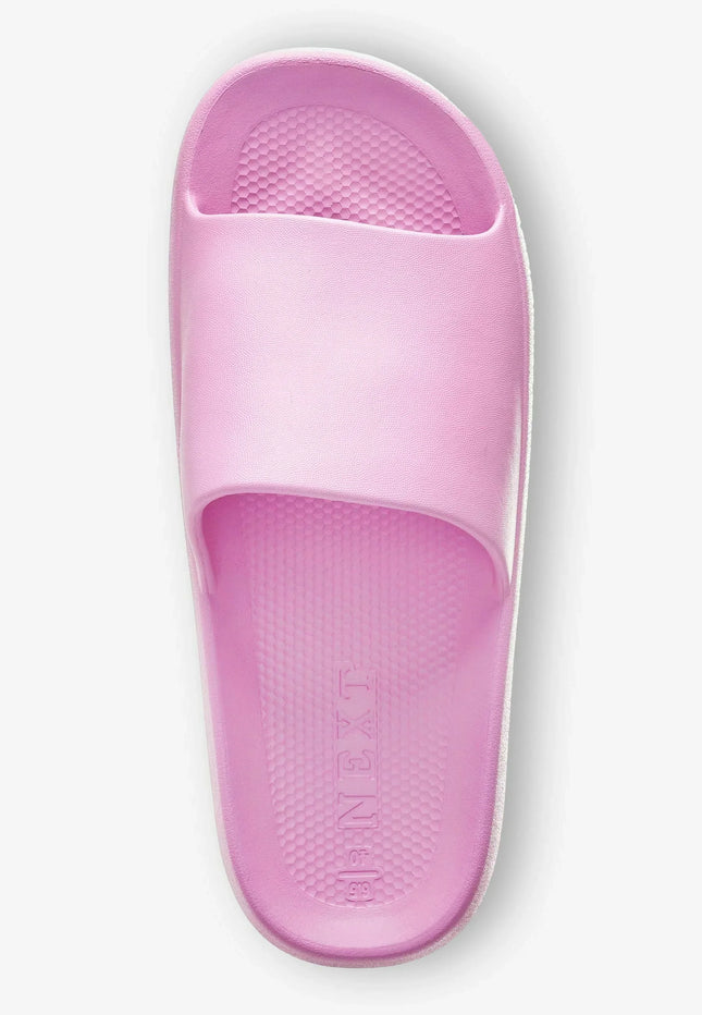 UNICORN Slippers with a wide strap over the foot and a sole with a pre-formed footbed and a ribbed profile on the bottom.